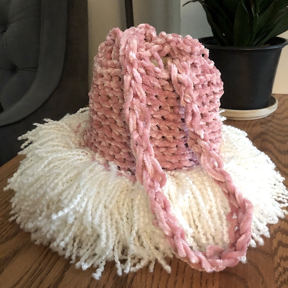 Pink, small, crochet Drawstring handbag.